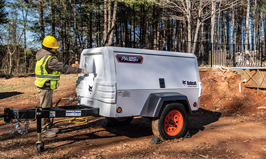 An Operator Adjusts Settings on a Bobcat PA185V Air Compressor for Hugg and Hall Equipment Co. in El Dorado, AR 